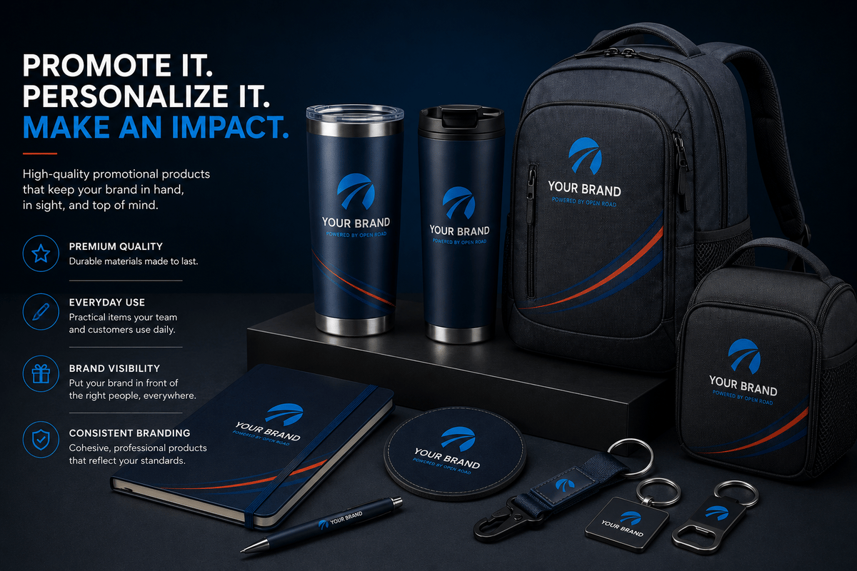 Open Road branded promo items — tumblers, backpack, notebook, and keytags